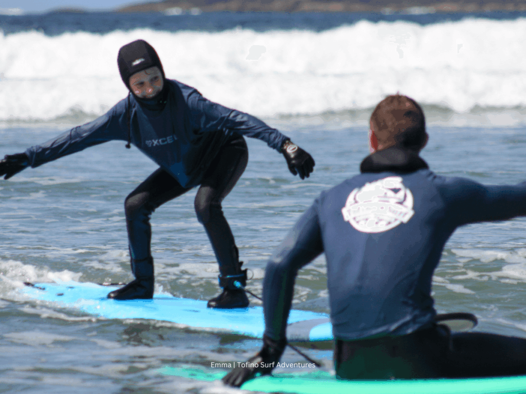 My oldest son getting up his surfboard on one of his first attempts