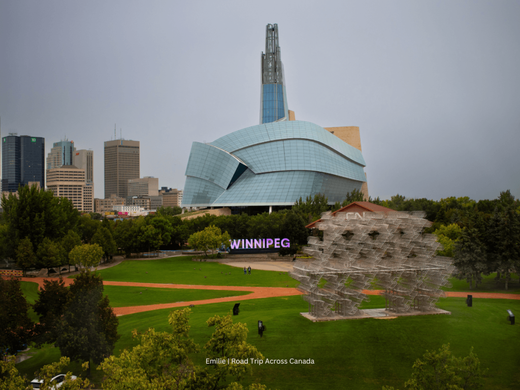 This was the View from the room at the Inn at the Forks in Winnipeg: the Canadian Human Rights Museum in the background with the Winnipeg Sign.