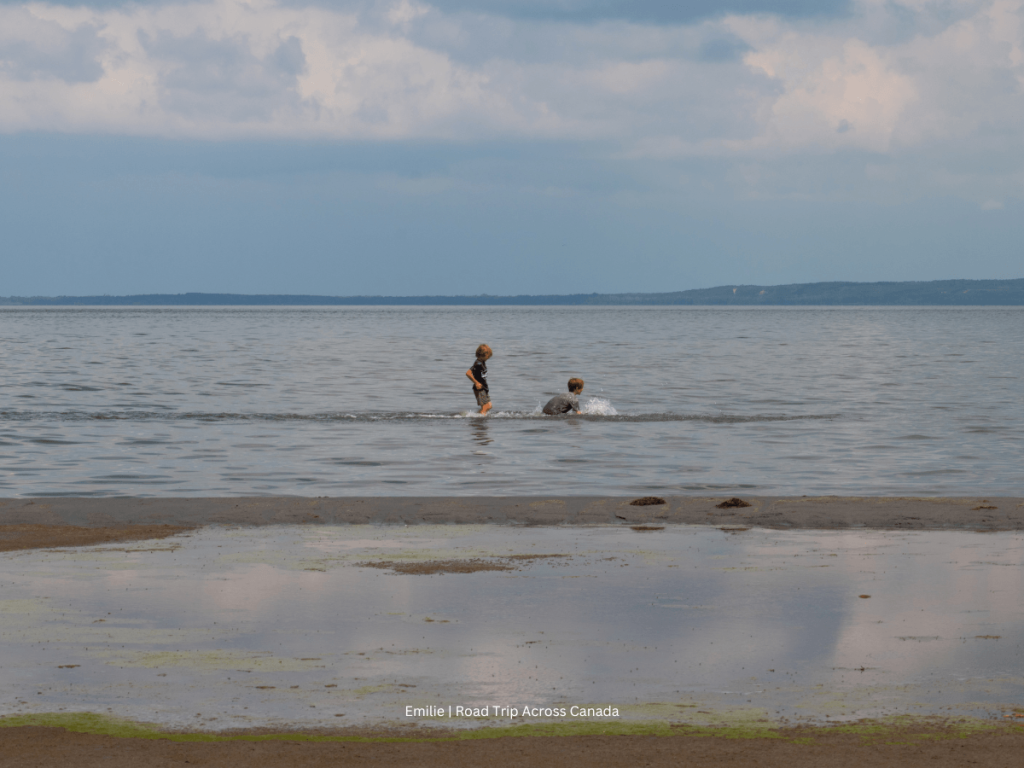 The kids enjoying the water at Rochon Sands on Buffalo Lake near Stettler
