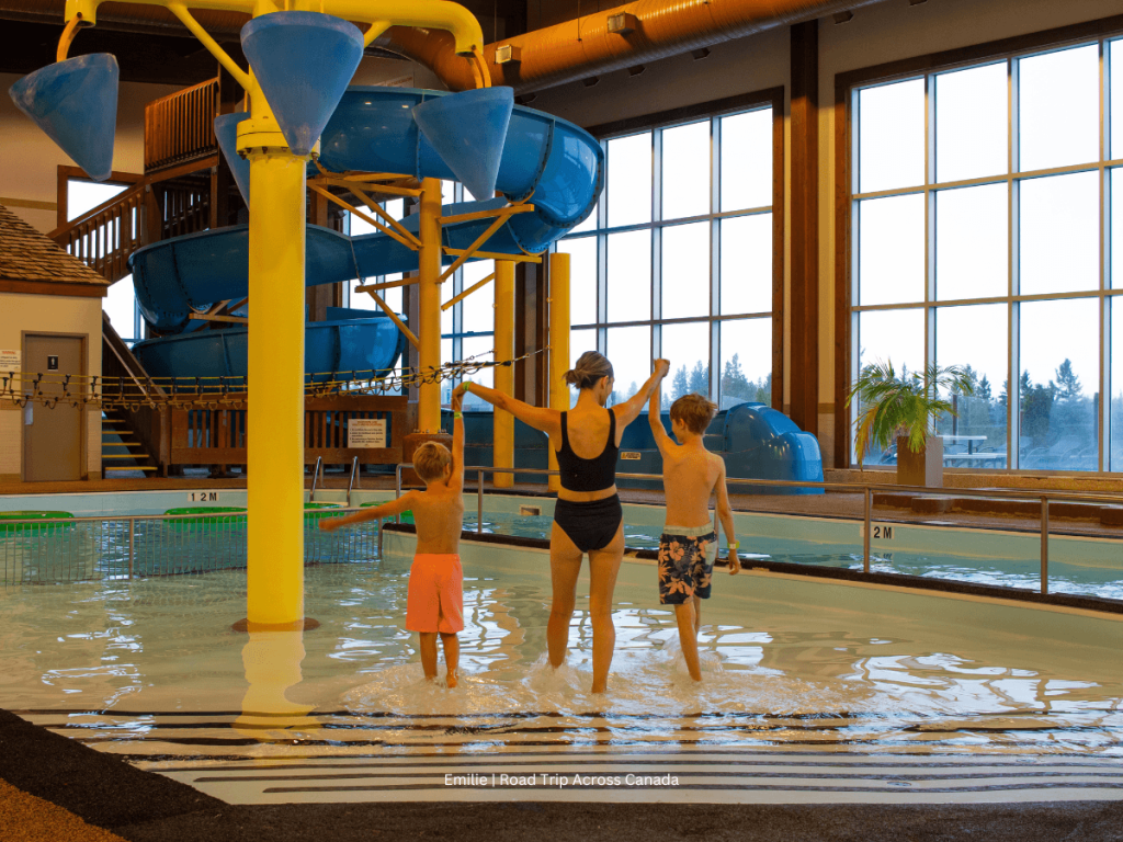 Enjoying the pool with a waterslide at Elkhorn Resort